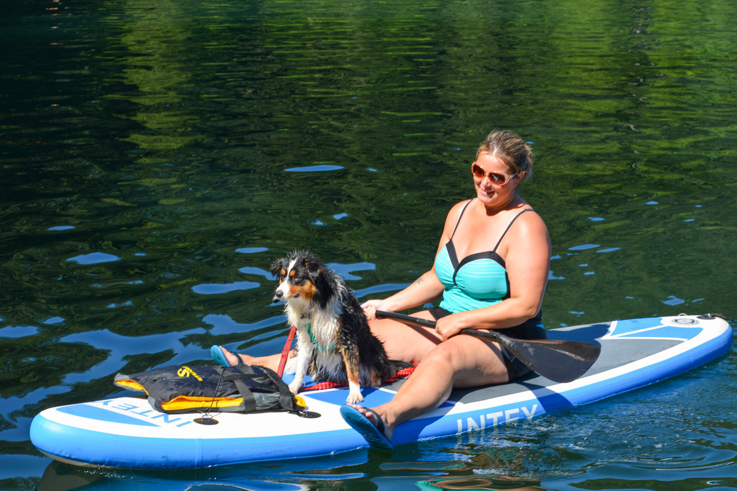 One paddleboarder brought along her dog to beat the heat on June 26 at Battle Ground Lake State Park.